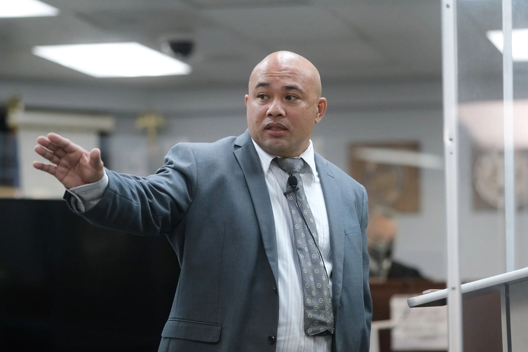 Peter J. Santos addressing a courtroom on Guam